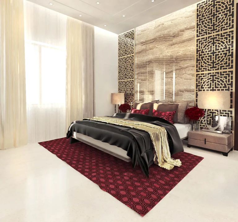 Luxury modern bedroom interior with an elegant black and gold bed, decorative wall panels, ambient lighting, and contemporary furnishings.
